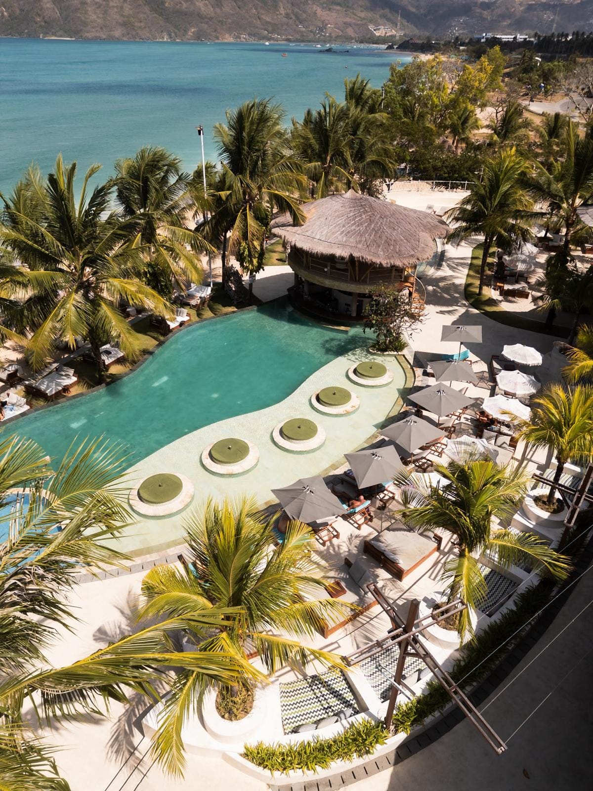 Pool with sunken seating and the bay beyond