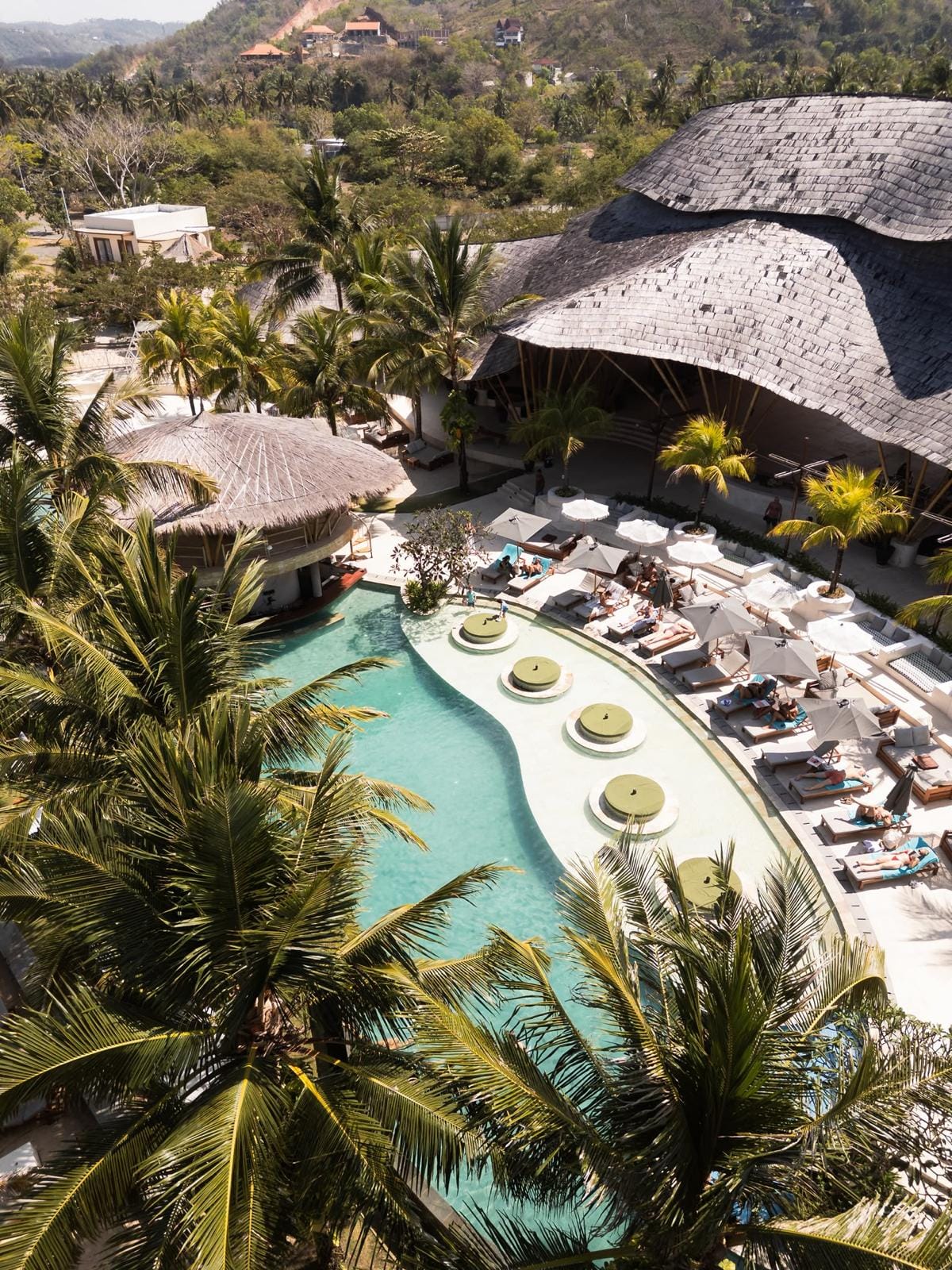 Pool deck beneath the shingle roofs